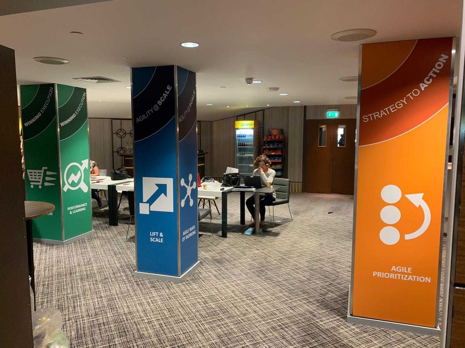 Pillar and column branding with wraparound graphics
